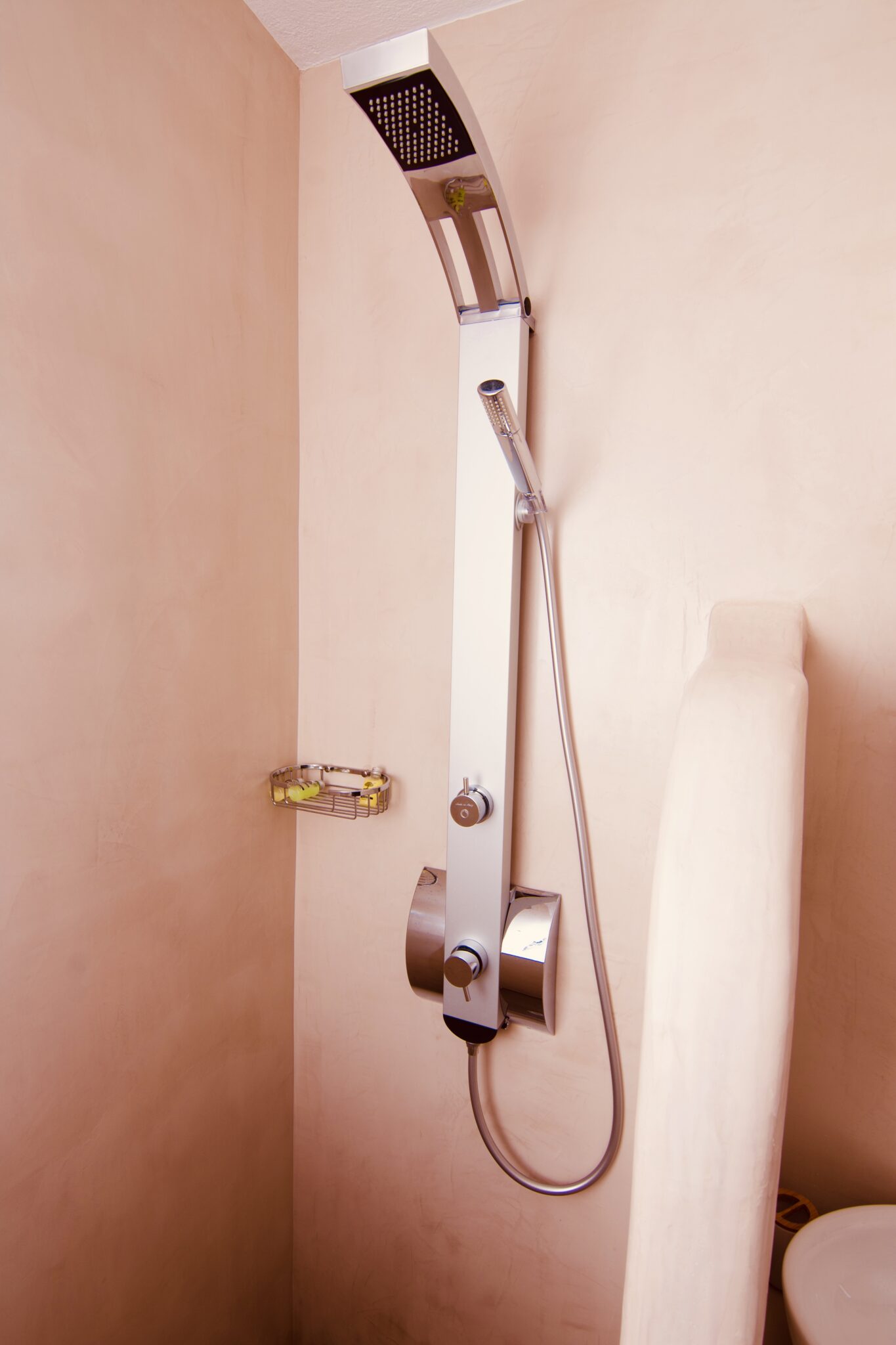 Apartment in Chora – bathroom detail, rain shower and chrome fittings