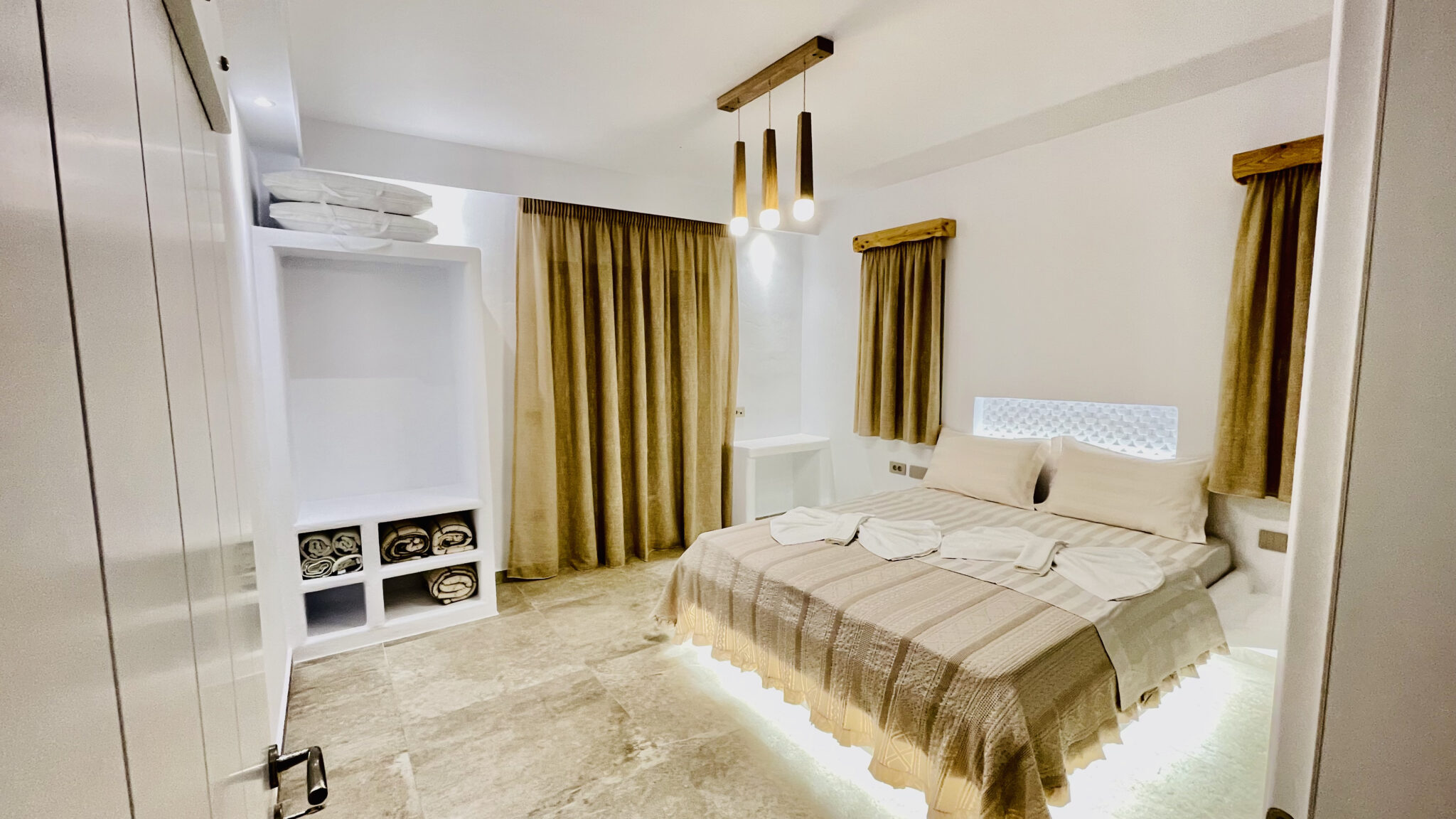 Villa with Semi-private Pool – king-size bedroom with linen curtains and natural light