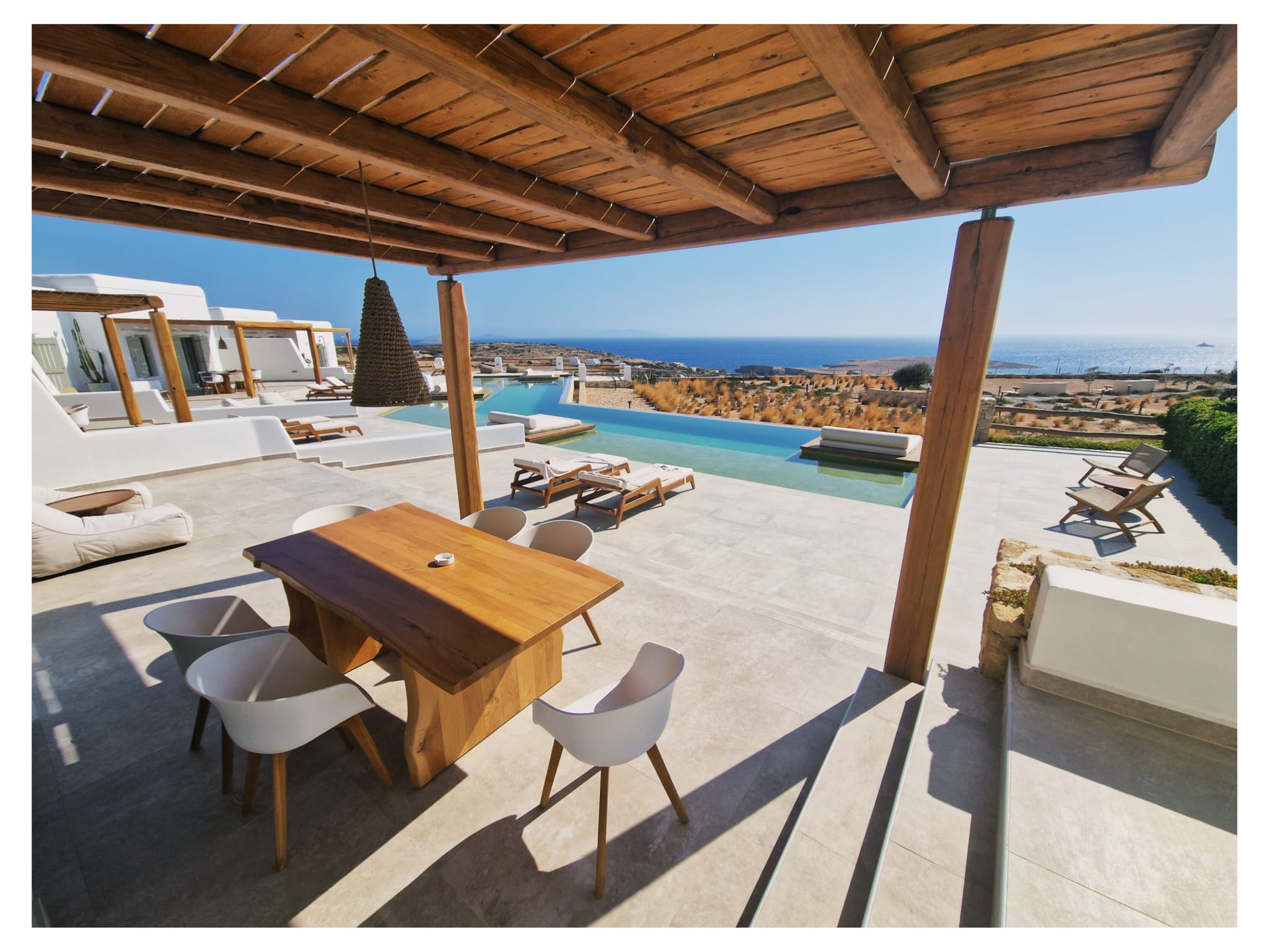 Pergola-shaded dining table on the terrace